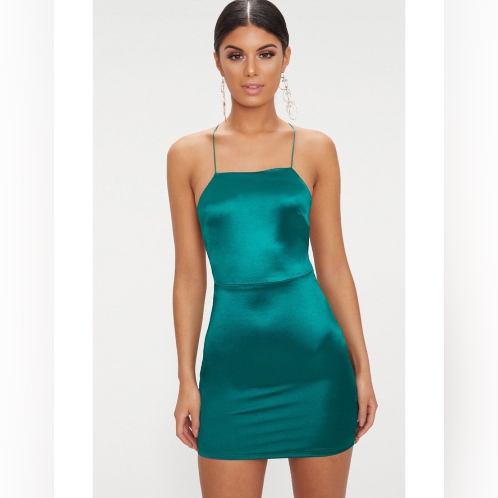Emerald Green high neck strappy bodycon dress from Pretty Little Thing